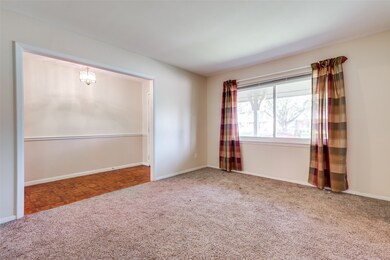 Living room at front of home would also make a great office.