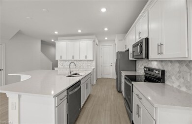 Interior photos are of a similar Augusta plan. Ill