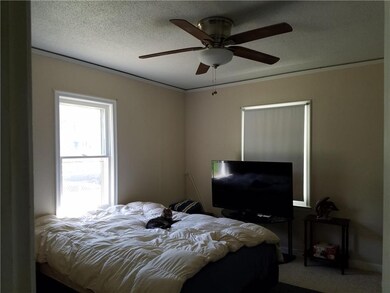 Two windows in this master bedroom