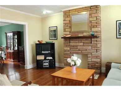 Living Room. Refinished original hardwood floors a