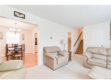 View of the living room looking into the dining room.