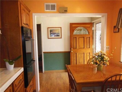 View of wood front door entrance.