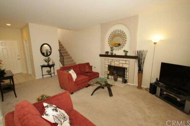 The welcoming Entry-level living room has a gorgeo