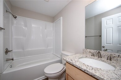 The gorgeous full bathroom offers tub/shower combo