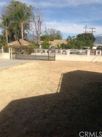 Front yard with private gate