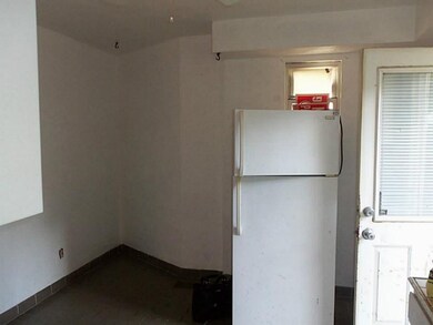 Exterior Front. First floor Unit Kitchen