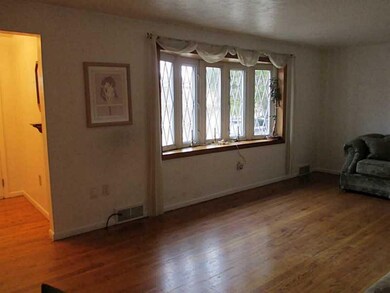Living Room. You can see part of the entry to the 
