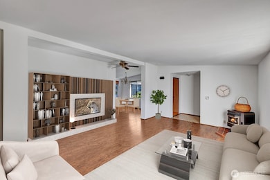 Virtually staged spacious living room. Formal entry has foyer area and coat closet for guests jackets etc. Freshly painted interior walls and ceilings. Ceiling fans for your comfort.