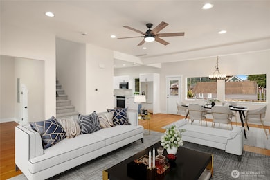 Large great room open to the dining and kitchen areas