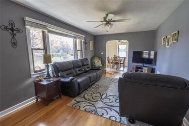 Large living room, wood floors, newer windows