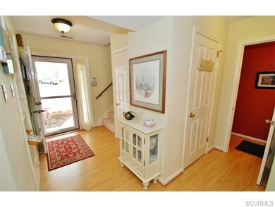 The Foyer features 2 closets and a Half Bath