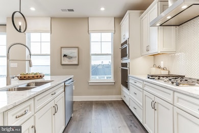K. Hovnanian’s® Four Seasons at Kent Island - Luxury Condos unit 2124, Chester, MD 21619 - photo 5