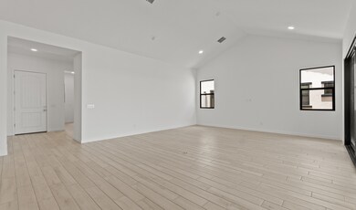 Great room with vaulted ceiling