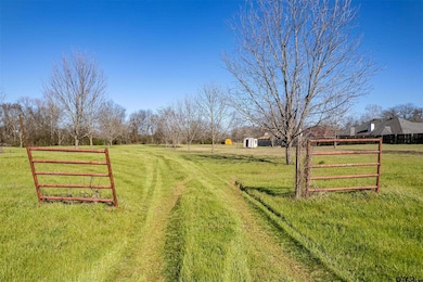 View of home's community with a rural view and a l