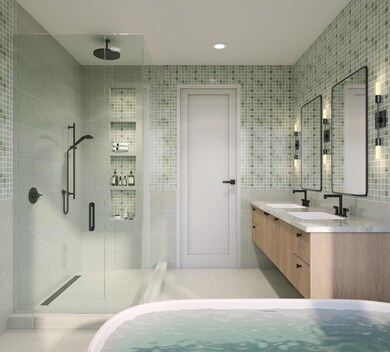 Full bathroom featuring a shower stall, tile wall