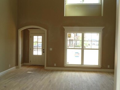 Beautiful entry way in two story living room