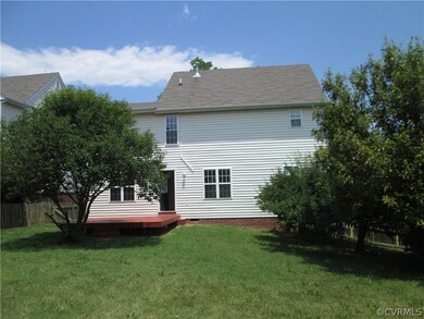 rear yard planted with fruit trees