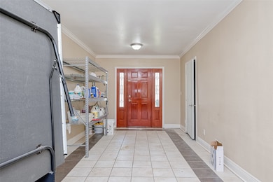 The room that connects the garage to the home.