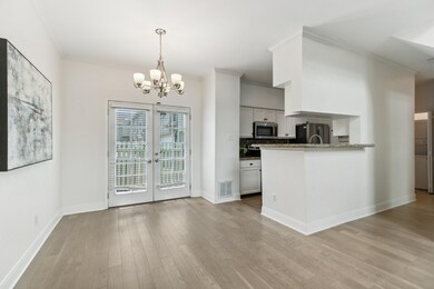 View from the dining area to the updated kitchen a