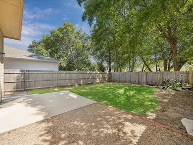 Fenced backyard featuring a patio area