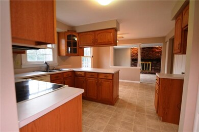 Kitchen off the dining room and open to the family