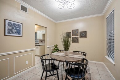 The dining room sits just off the front foyer and