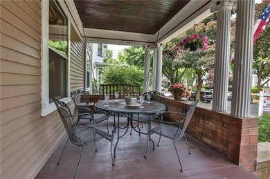 Large enough for a table, porch swing and end tabl