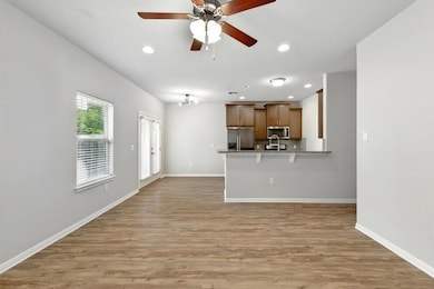 Unfurnished living room with recessed lighting, l