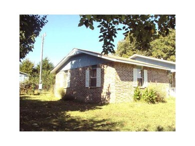 Exterior Back/Side. South Side