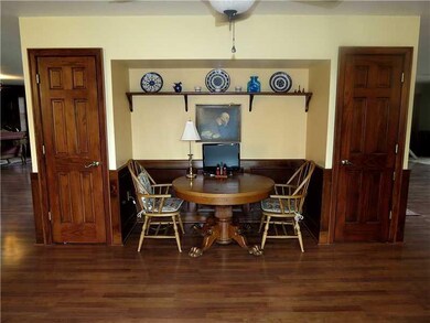 Kitchen. A cozy breakfast nook is one of many inti