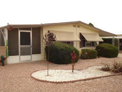 Front View w/Screened in Patio Area
