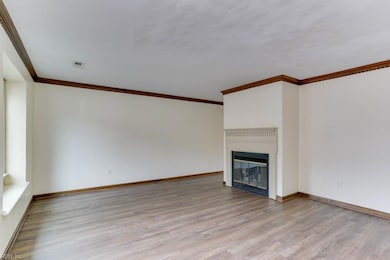 Family room is spacious, perfect for a sectional or large furniture