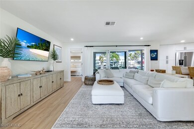 Living room featuring recessed lighting, light woo