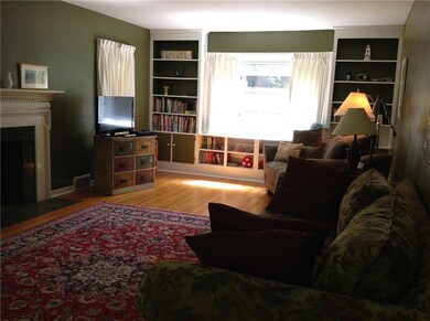 Bookshelf are built into the back wall of the room