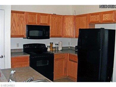 The kitchen provides plenty of counter space, rang
