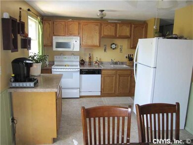 Kitchen. Spacious Eat-in kitchen offers new counte