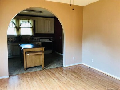 Living room and view of Kitchen