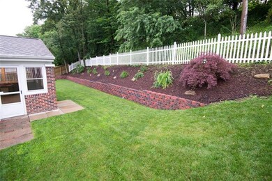 From the 3 season room exit to the rear yard.