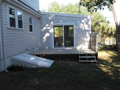 Exterior Back. nicely cared for yard
