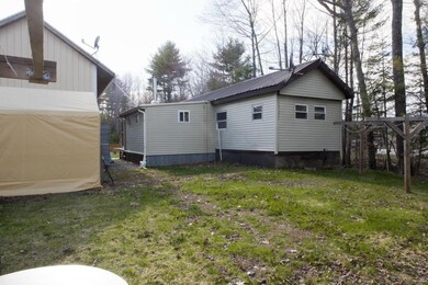 Back of home with clothes line