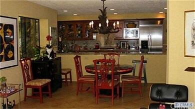 Dining Room with Kitchen Behind