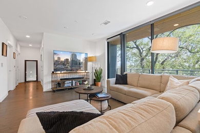 Living room featuring plenty of natural light, ha