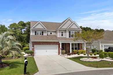 Craftsman inspired home with driveway, brick sidin