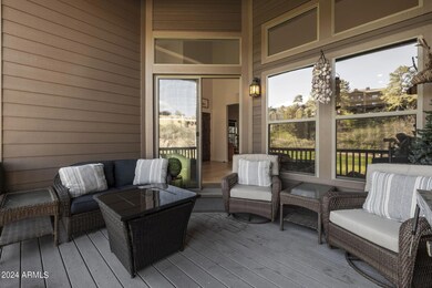 covered deck overlooks golf course