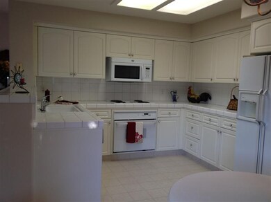 Light and Bright Kitchen open to living area