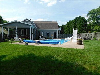 Rear of house with covered patio
