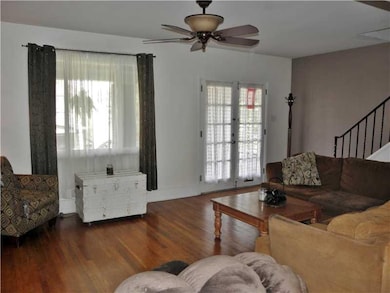 Living Room. Original Glass French Doors lead onto