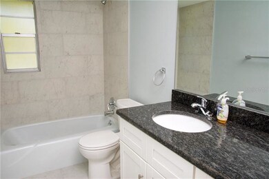 HALL BATH WITH COORDINATING DECOR FEATURES