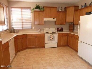 Kitchen with staggered cabinets