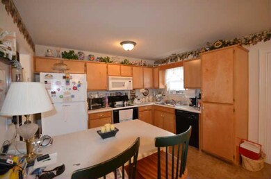 Kitchen With Lots Of Cabinet Space And Large Bar
